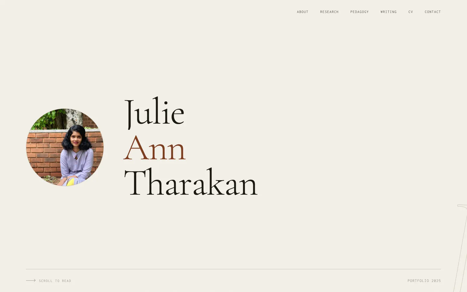 Julie Ann Tharakan site home screen: a round portrait beside her name set large in serif, rust accent on "Ann".