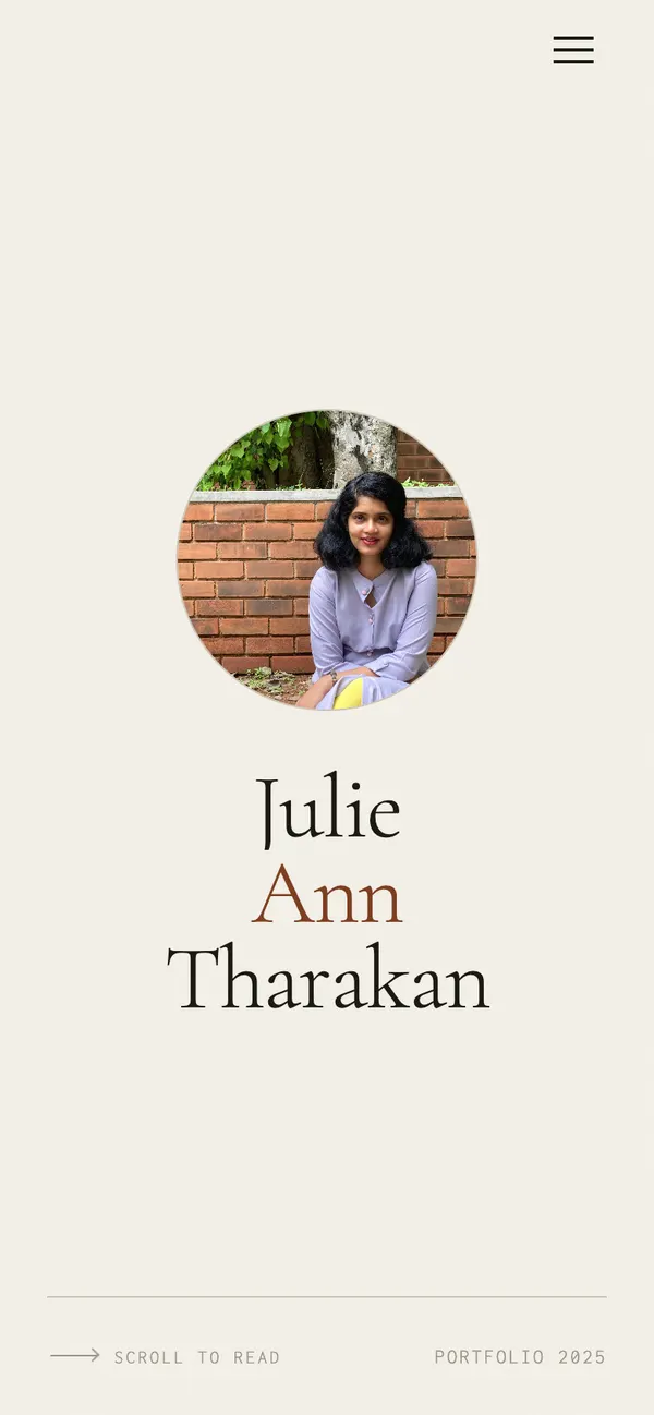 Julie Ann Tharakan site on a phone: portrait above her name, centred.