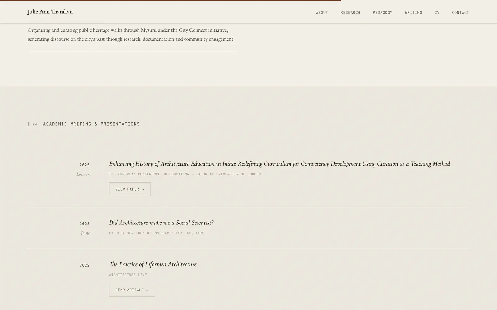 Writing section: papers and talks listed by year, each with a link button.